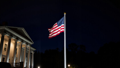 Fototapeta premium Illuminated American Flag on Flagpole Against Night Sky for Government Websites, Patriotism Promotion, Educational Materials, and Social Media Campaigns