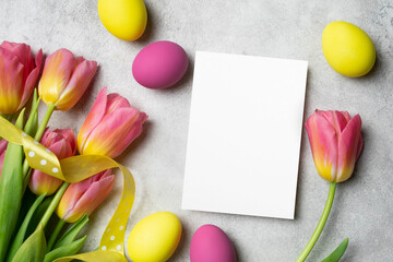 Easter holidays blank paper greeting card mockup with copy space for card design, flat lay with happy easter flyer card