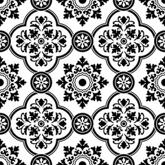 Seamless black and white pattern with azulejo style flowers and leaves. Swatch is included.