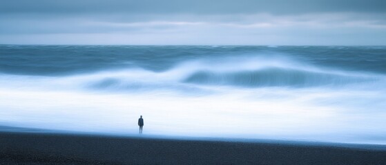 A lone figure stands by a vast, moody ocean as waves crash, capturing solitude and introspection in a serene seascape.