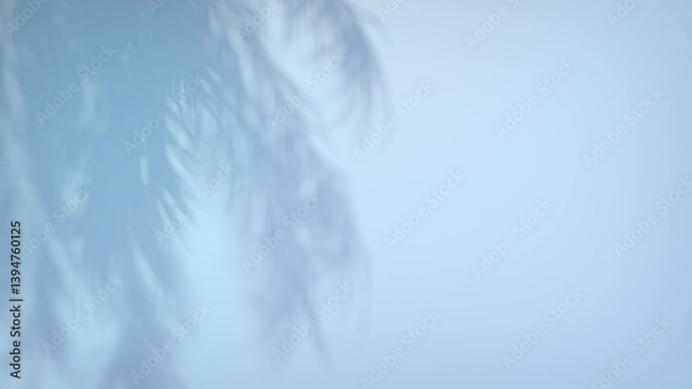 Wall mural 3d animation - shadow of palm leaves moving in the wind in a loop on an empty light blue wall at sun