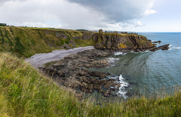 Dunnottar Castle rises in dramatic ruins atop a cliff overlooking the North Sea. Its breathtaking views, rich history, and rugged beauty make it one of Scotland’s most iconic and cinematic locations.