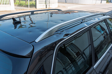 car roof hit by hail. storm damage