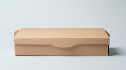 A simple kraft paper box rests on a soft light background, embodying minimalism and elegance.