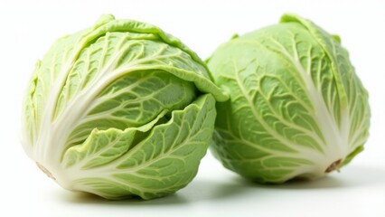 Fototapeta premium Two Green Cabbages on White Background