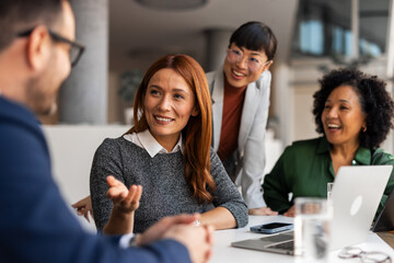 Happy Team Collaboration in a Bright Modern Office Setting