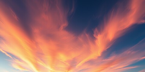 Obraz premium Dramatic Sunset Sky with Fiery Orange and Pink Cloudscape Breathtaking Natural Background Image