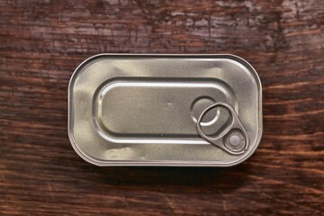 Can of fish or cod liver on a table