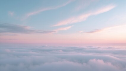 The dawn brings soft pastel hues to the sky, highlighting delicate clouds and a gentle light appearing over the horizon, evoking a serene ambiance