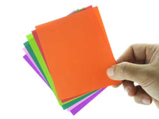 Female hand holding colorful notes isolated on white background with clipping path.