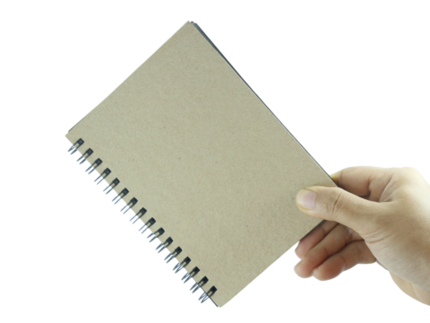 Female hand holding brown notebook isolated on white background with clipping path.