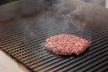 Fresh hamburger meat cutlet fry on grill