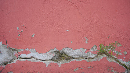 Crack concrete pink wall or Cement wall background.