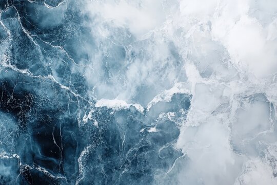 Abstract aerial view of the ocean water and white foam