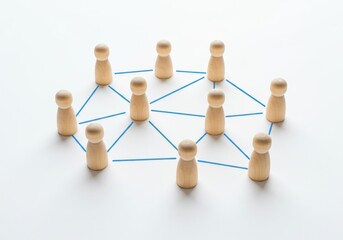 Fototapeta premium Wooden figures connected by blue lines in a circular star pattern on white background symbolizing teamwork and distributed systems