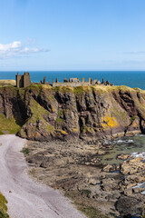 Dunnottar Castle rises in dramatic ruins atop a cliff overlooking the North Sea. Its breathtaking...