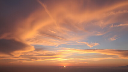 Dramatic red sunset sky with clouds painted the evening landscape in beautiful colors
