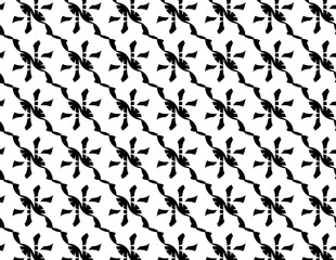 A monochrome pattern showcasing an array of flowers in black and white, creating a visually striking design