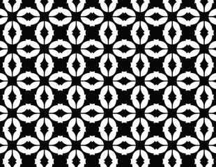  A monochrome pattern showcasing a repetitive design, emphasizing contrast and texture in black and white