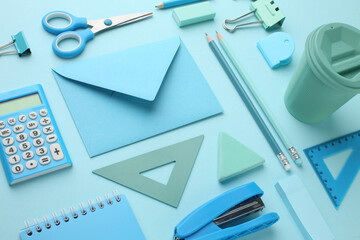 Stationery calculator ruler calculator and school stuff on coloured background. Concept of school and college learning