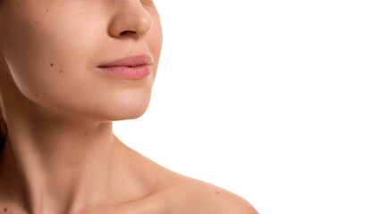 Cropped photo of female neck line and chin, with toned, soft and healthy skin against white background. Double chin prevention. Concept of youth and natural beauty, cosmetology treatment, cosmetic