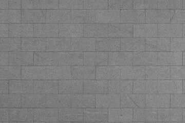 Classic vintage dark grey granite background, Abstract geometric brick blocks pattern texture, Outdoor building block wall, Can be used as background for display or montage your products.