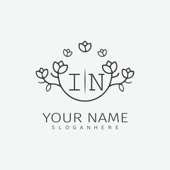 Obraz premium initial monogram wedding with creative circle line flower.