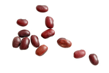 A bunch of red beans are scattered on a white background