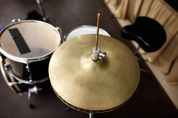 A drum set with a cymbal on top of it