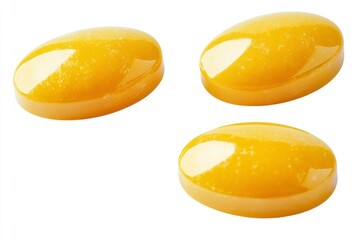 Analyzing Three Yellow Pill Capsules on White Background for Pharmaceutical Use
