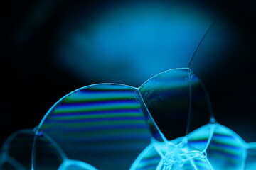 Blue liquid texture in macro, bright fluid background, smooth movement, molecular structure