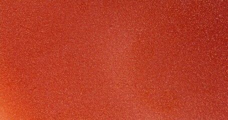 Fototapeta premium The Red glittering water slowly flows into beautiful abstract patterns. An organic background for visuals and motion graphics.