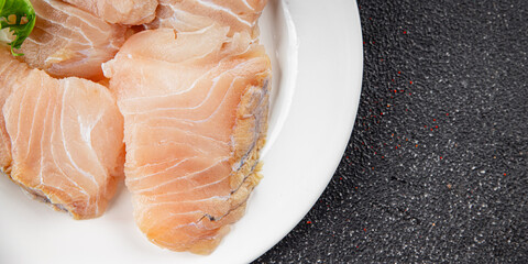 Raw fish fillet white fish seafood appetizer dish organic product fresh tasty gourmet food background on the table rustic food top view copy space pescetarian diet