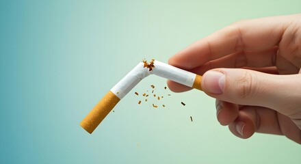 Hand Breaking Cigarette: Quit Smoking Image for No Tobacco Day, Promoting Health Awareness and a Smoke-Free Lifestyle. - high resolution premium collection