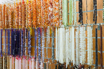 Assorted bead strands on display in jewelry store
