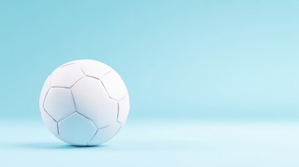 Fototapeta premium Single white soccer ball on pastel light blue background