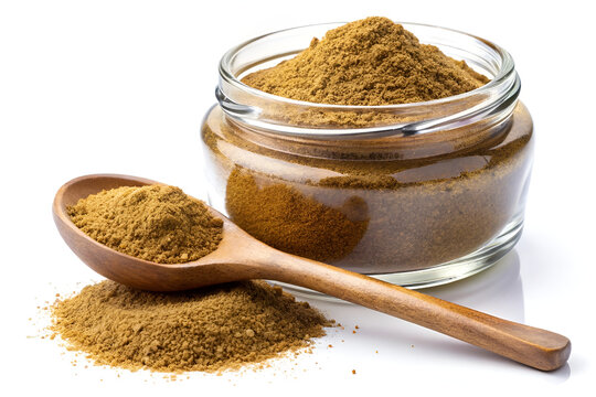 cumin powder glass jar spoon on white