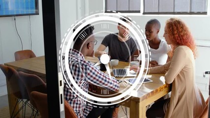 Collaborating at table, diverse team discussing project with clock animation overlay - Powered by Adobe