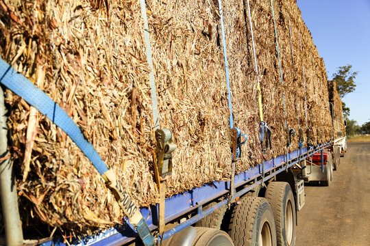 Large hay bales on semi-trailer heading to drought affected areas of QLD.