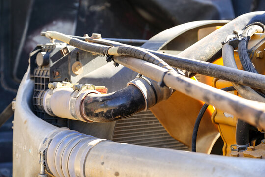Engine compartment under the bonnet of a semi-trailer truck.