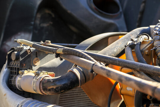 Engine compartment under the bonnet of a semi-trailer truck.