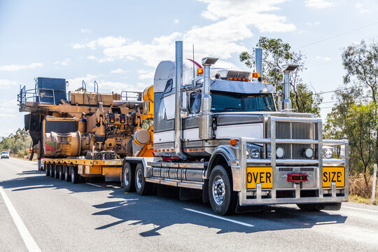Over size load on truck transporting mining equipment