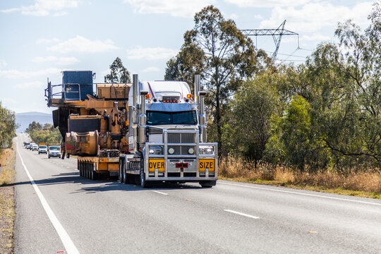 Over size load on truck transporting mining equipment