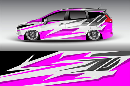 Stylish modified car with vibrant pink and silver graphics parked on a smooth surface, showcasing its unique design