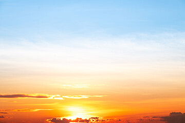 Sky,sunset, beautiful , luxury soft gradient orange gold clouds and sunlight on the blue sky perfect for the background, Sunrise on morning or everning in winter warm time ,Twilight summer,silhouette