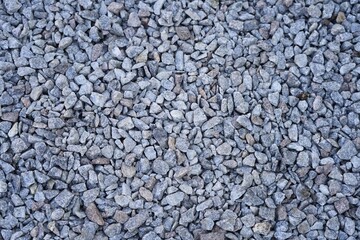 Background. Lots of small grey rubble, stones.