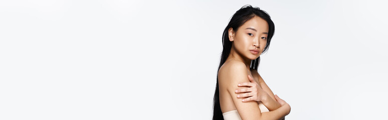 Youthful beauty captures elegance in serene natural light showcasing grace and style