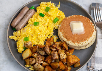 pancakes with  scramble eggs and breakfast sausage