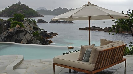 Luxurious outdoor seating area overlooking a tranquil ocean view.