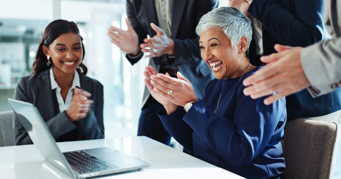 Laptop, business woman and group applause for achievement, milestone or celebrate financial profit. Team manager, computer and clapping for success, excited or well done for investment goal in office
